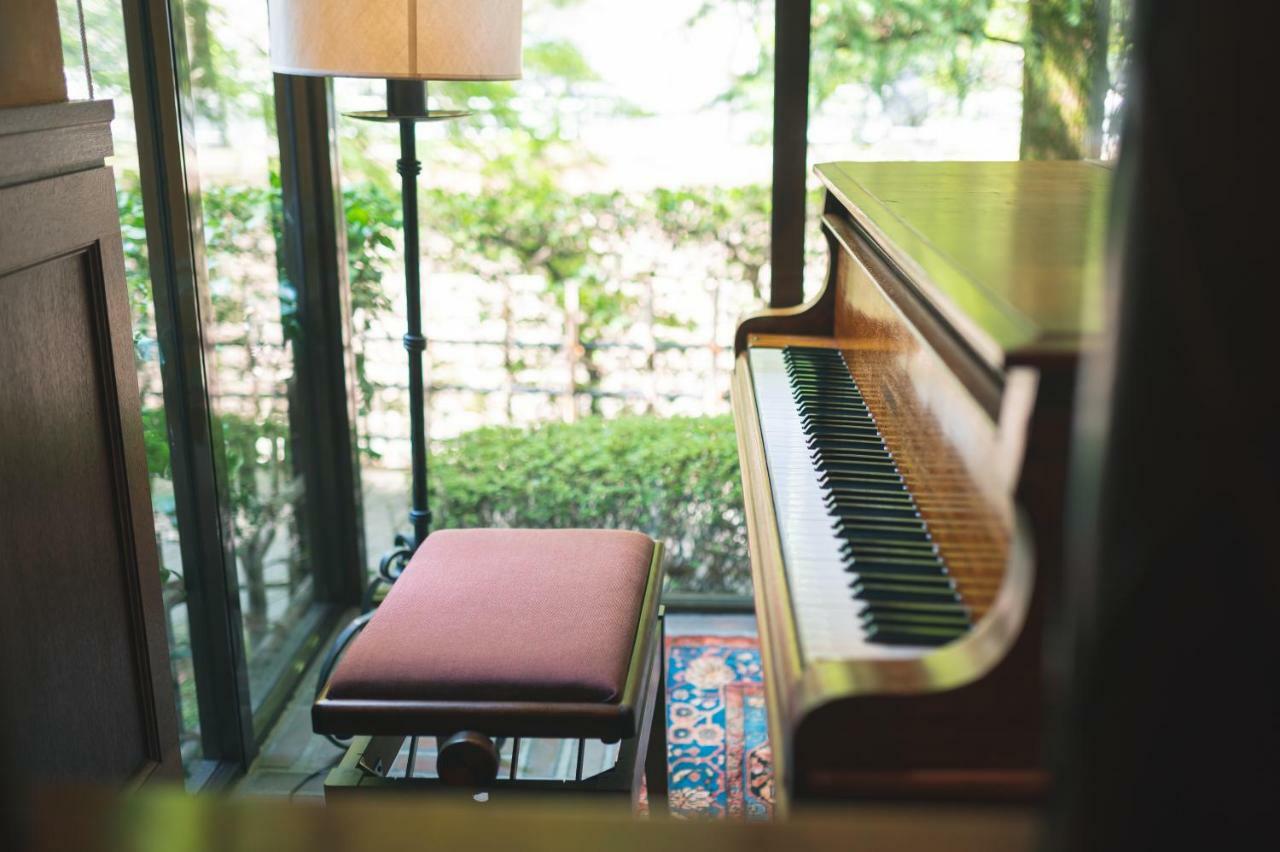 Hotel Arima Onsen Tocen Goshobo Kobe Zewnętrze zdjęcie Piano in the lobby